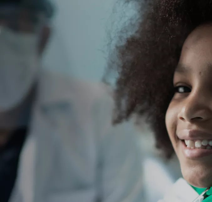 Banner Unimed Odonto Essencial Exclusivo Menina sorrindo no dentista Banner Unimed Odonto Essencial Exclusivo Menina sorrindo no dentista